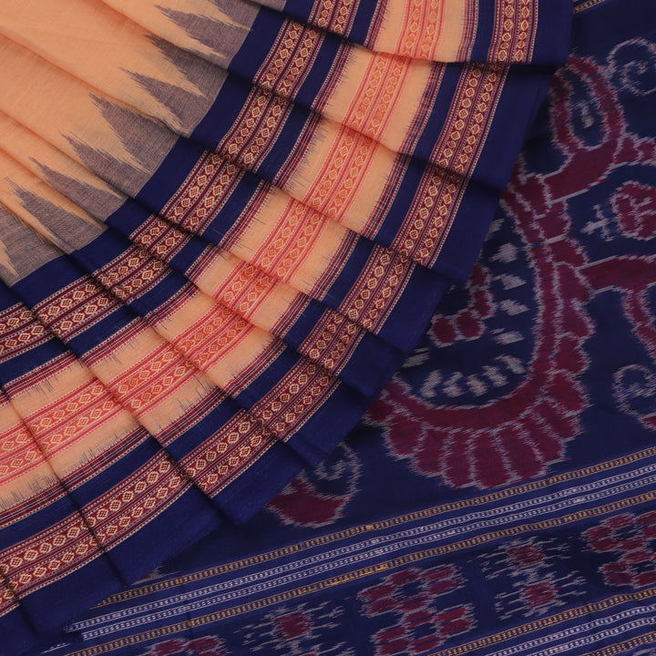 Cream cotton Bomkai saree with blue butta pattern, full view.