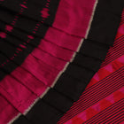 Full view of an intricately patterned black silk Khandua saree with black motifs