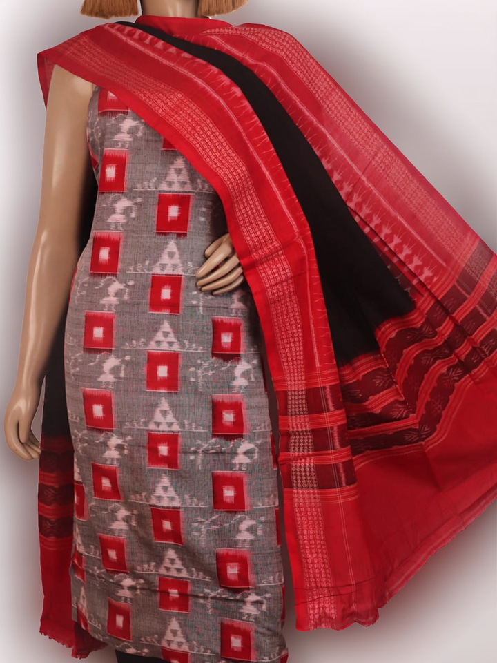 Detail of the grey and black Sambalpuri cotton dress material's blouse piece with motifs.