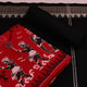 Close-up showcasing the intricate doll pattern on the cotton sambalpuri dress material in red and black.