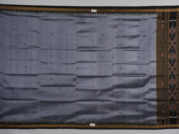 Full styling view of a model wearing a grey and black Khandua silk saree featuring elegant butta motifs.