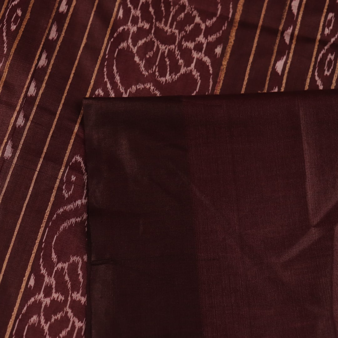 Close-up view of the textured Tussar Silk fabric of a Cream and Maroon Plain Tussar Saree