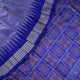 Ultra close-up of Bomkai Silk Saree fabric, highlighting the exquisite grey and blue weave texture.