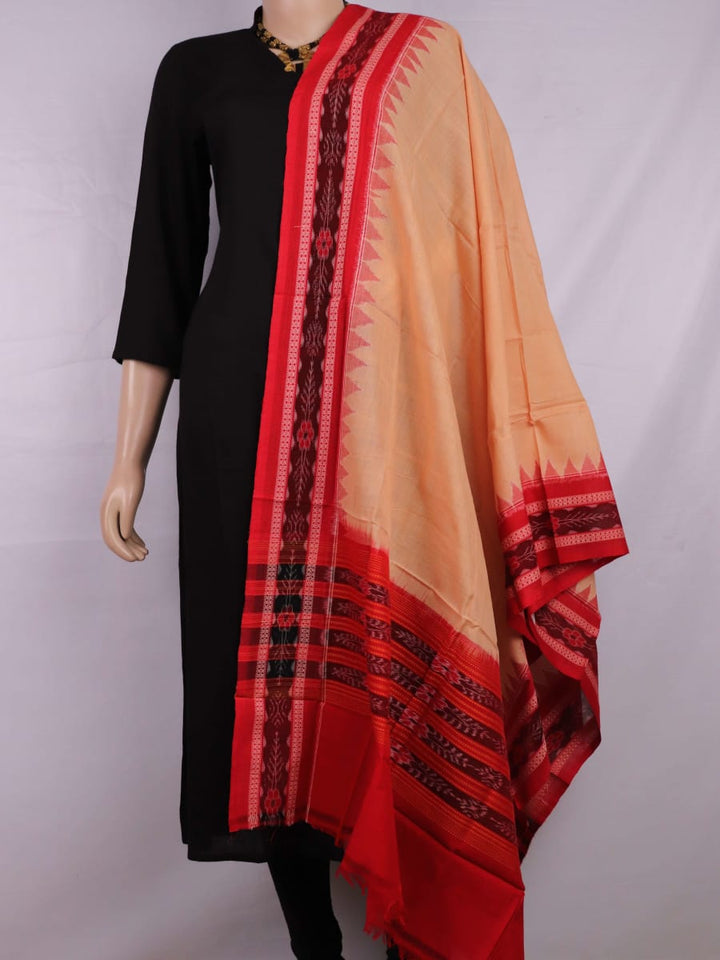 Cream-colored cotton Sambalpuri dupatta with red plain body and contrasting border, elegantly draped