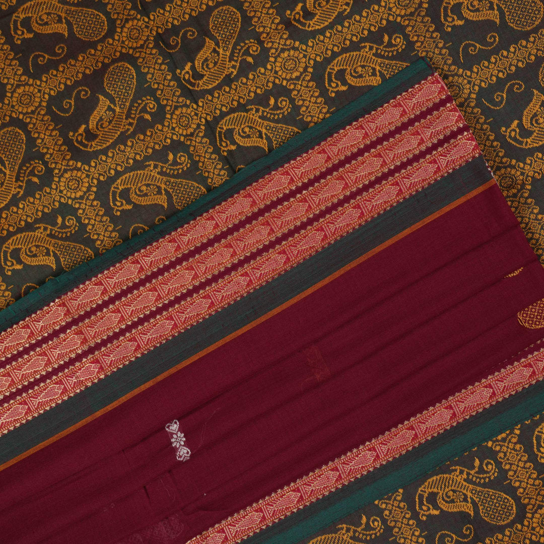 Full layout of the maroon and green Bomkai cotton saree showing the complete body and pallu design.