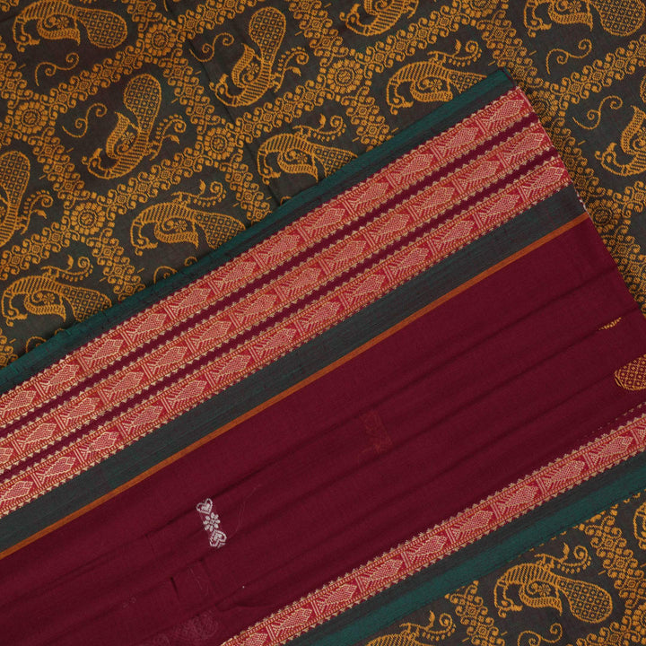 Full layout of the maroon and green Bomkai cotton saree showing the complete body and pallu design.