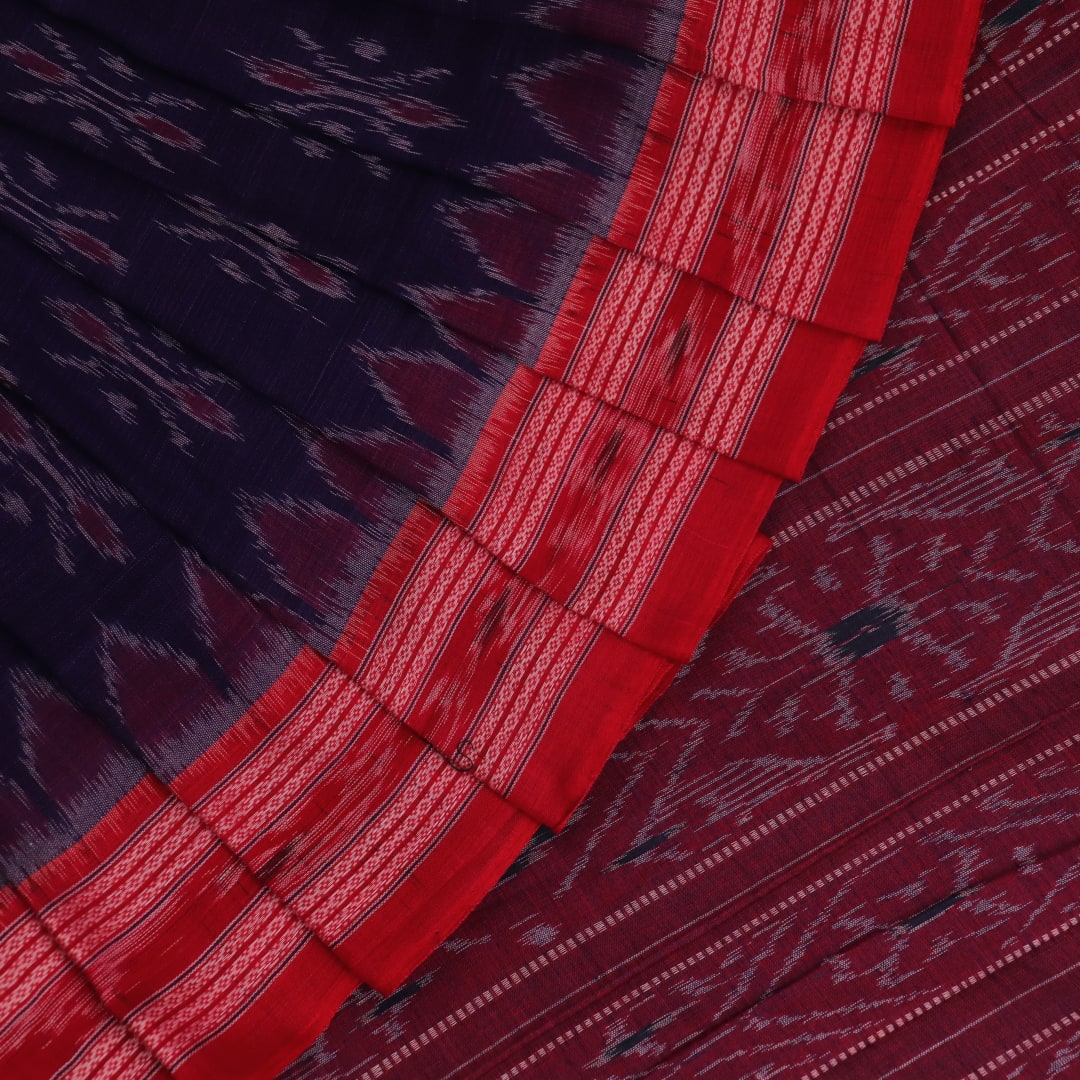 Blue Sambalpuri cotton saree draped, showcasing the overall styling and motifs.