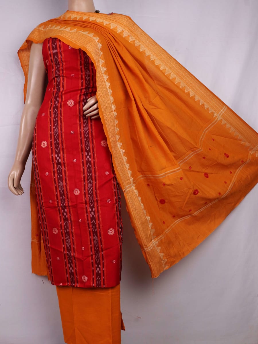 Close-up view of a red and yellow cotton Sambalpuri dress material with intricate motif patterns