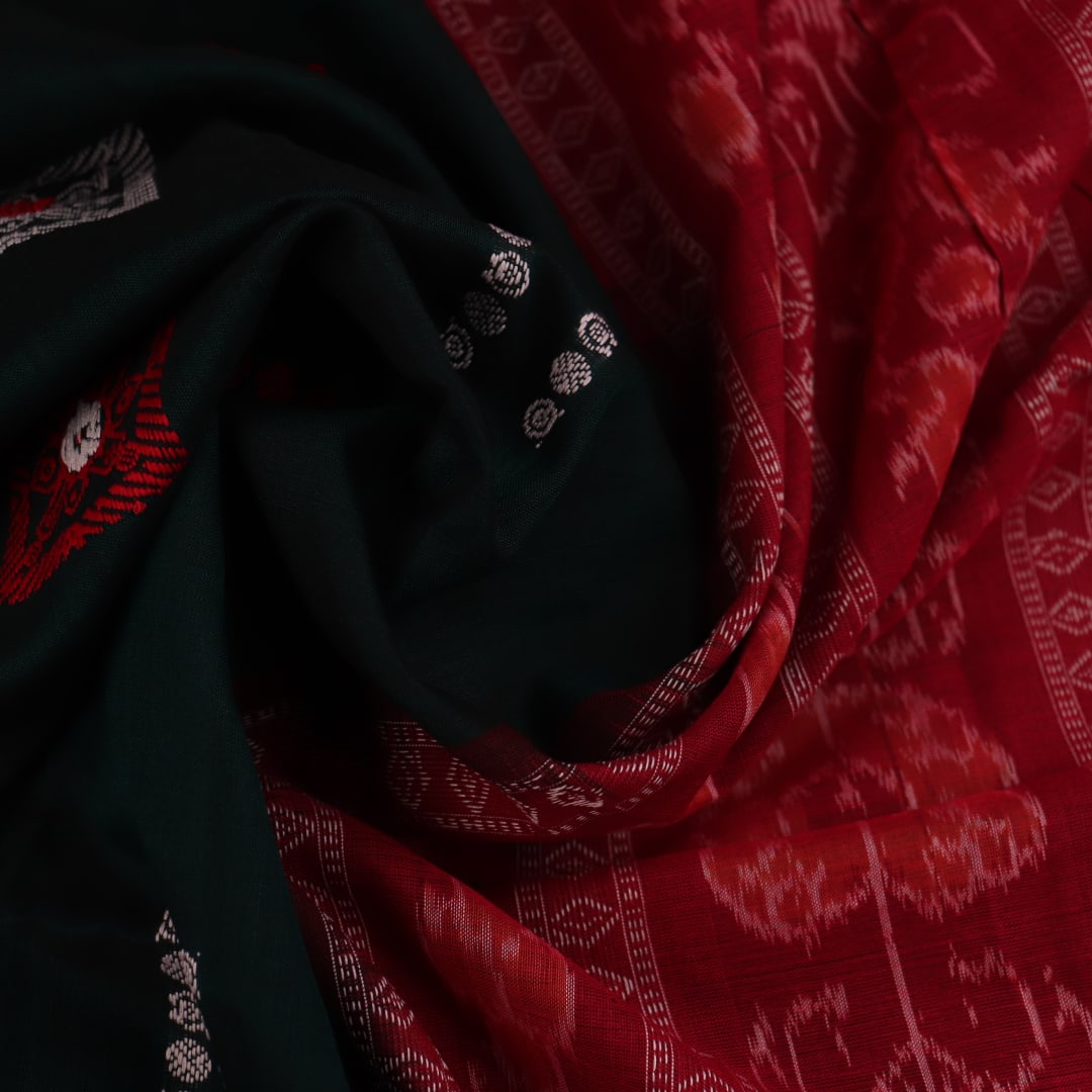 Full view of a green and red handloom Bomkai Cotton Saree with butta pattern.