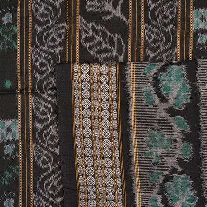 Full flat layout of the green and black Sambalpuri cotton saree with detailed motifs and pallu design
