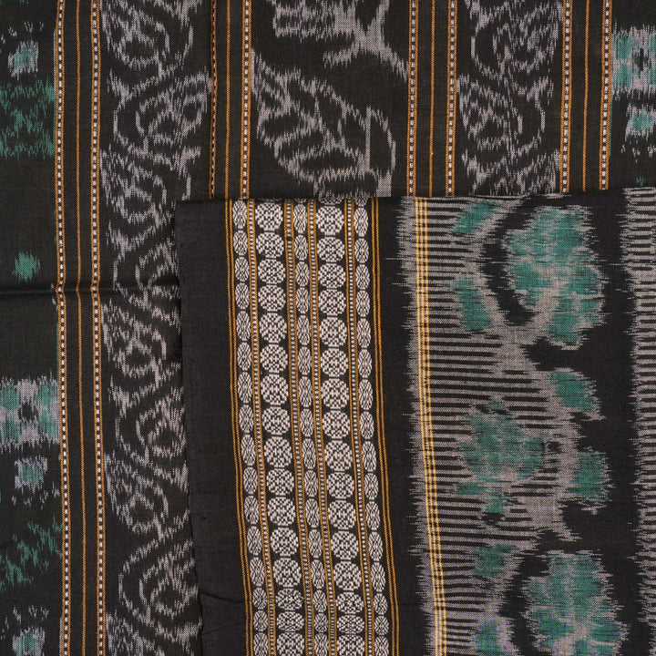 Full flat layout of the green and black Sambalpuri cotton saree with detailed motifs and pallu design