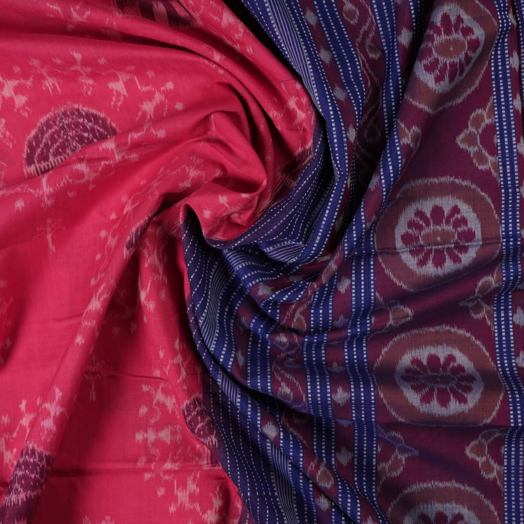 Full layout of the pink and blue Sambalpuri cotton saree displaying the body, border, and motifs.