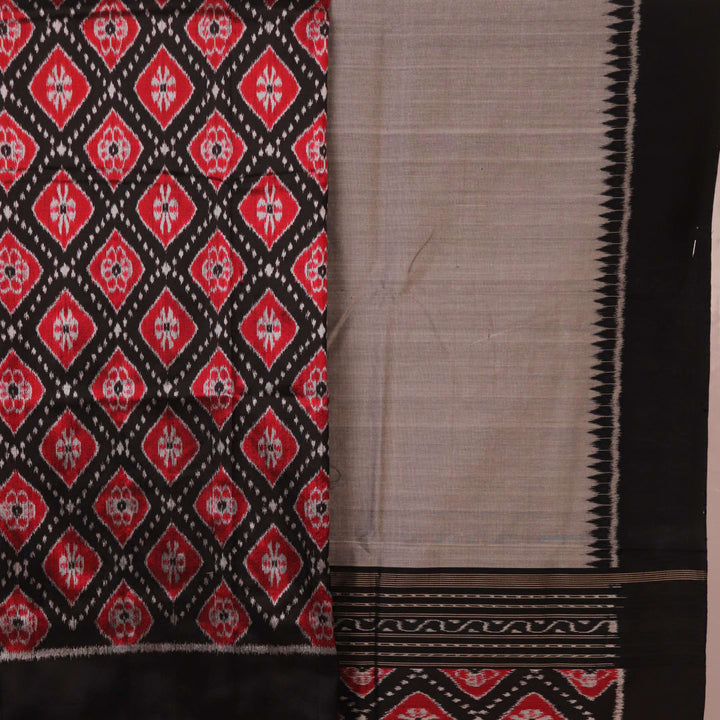 Detail of black and grey Sambalpuri Silk Dress Material blouse piece with motifs.