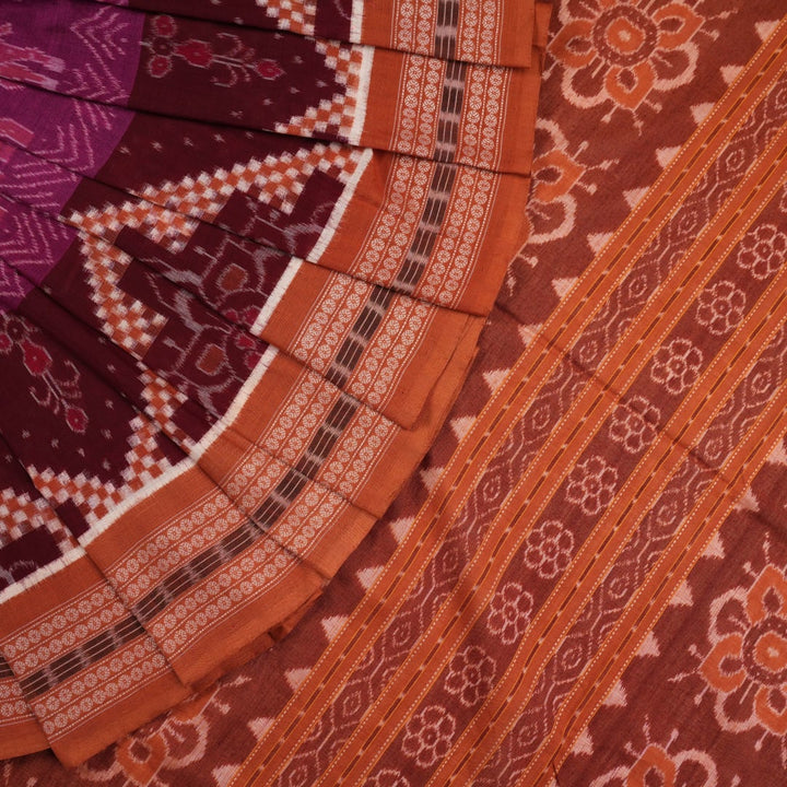 Elegant model drape of the brown Pasapalli Sambalpuri cotton saree showing the full traditional look.