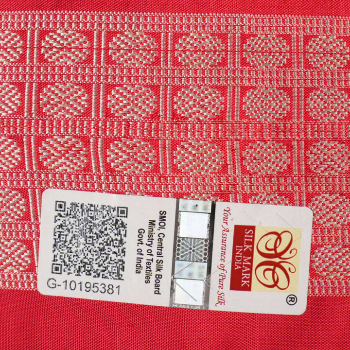 Close-up showing the luxurious texture and fine weave of the black Sambalpuri silk fabric.