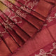 Close-up of the distinctive slub texture of a multi-color printed Tussar Silk saree.
