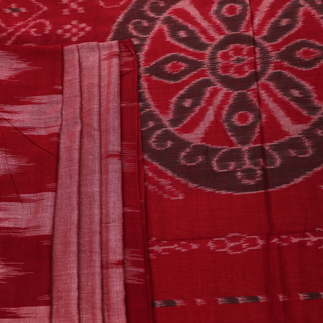 Draped multi-color Sambalpuri cotton saree with maroon highlights and plain body.