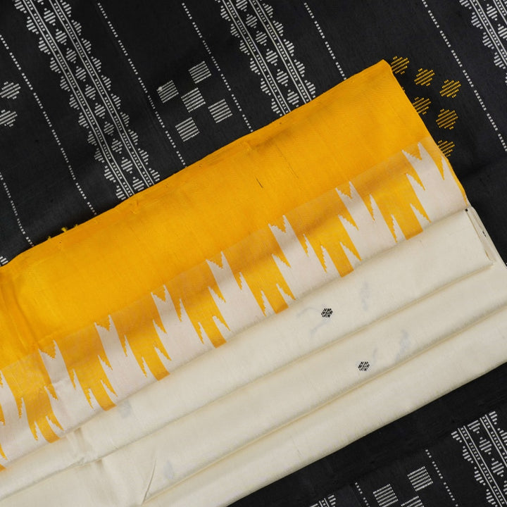 Close-up of the luxurious Berhampuri Silk Saree fabric, revealing the fine weave and soft texture.