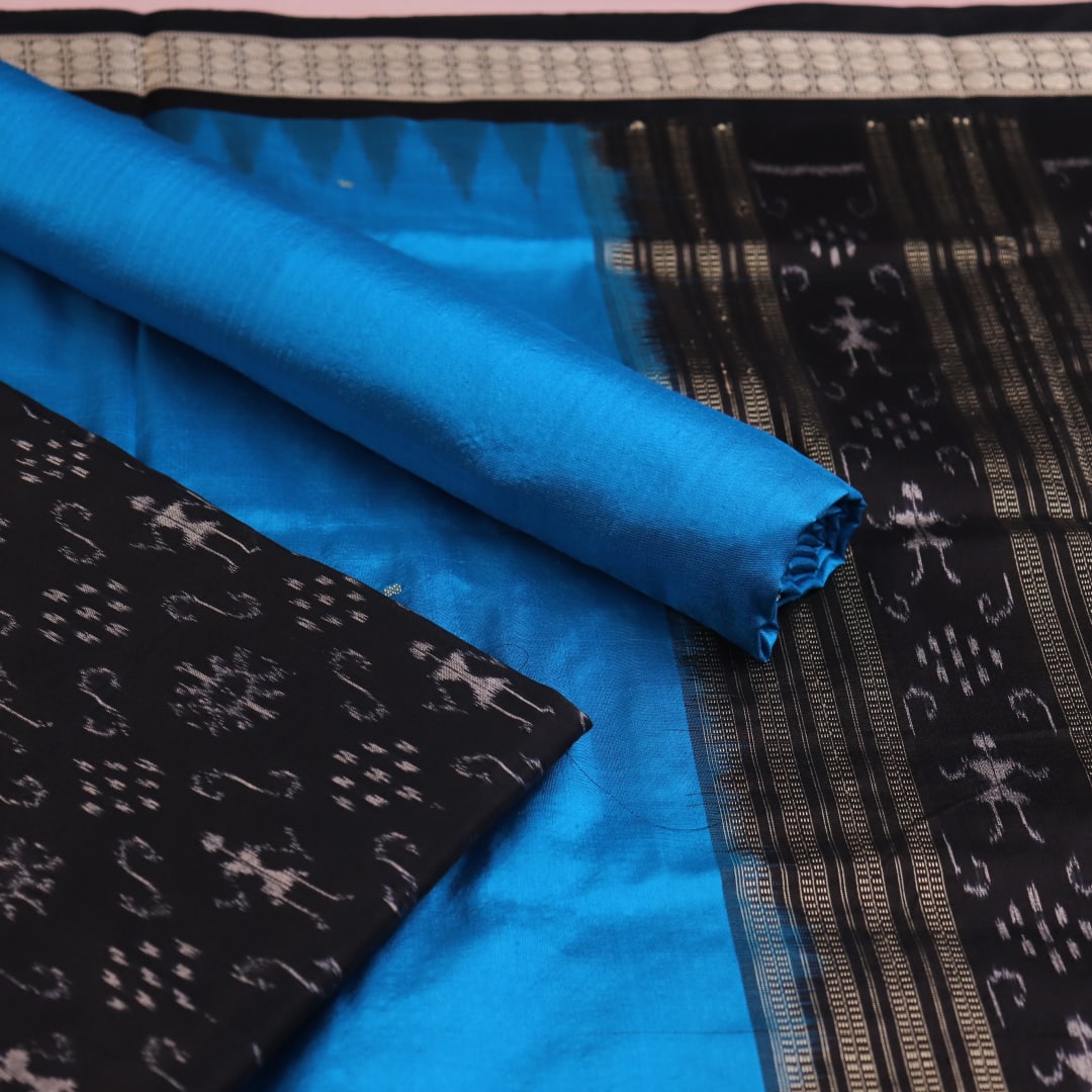 Detail of Sambalpuri black and blue silk dress material blouse piece with motifs.