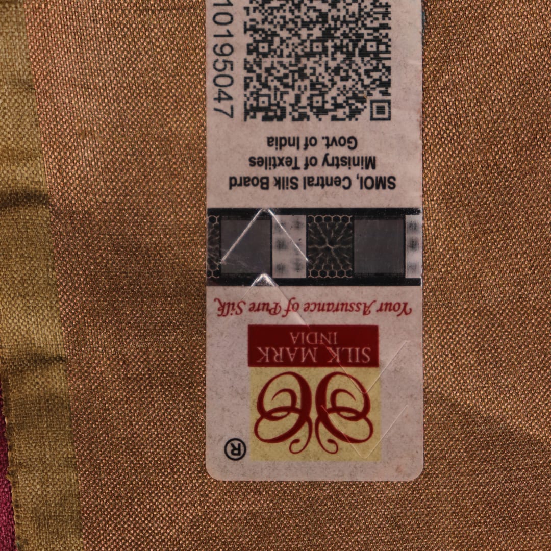 Close-up of the distinctive slub texture of a multi-color printed Tussar Silk saree.