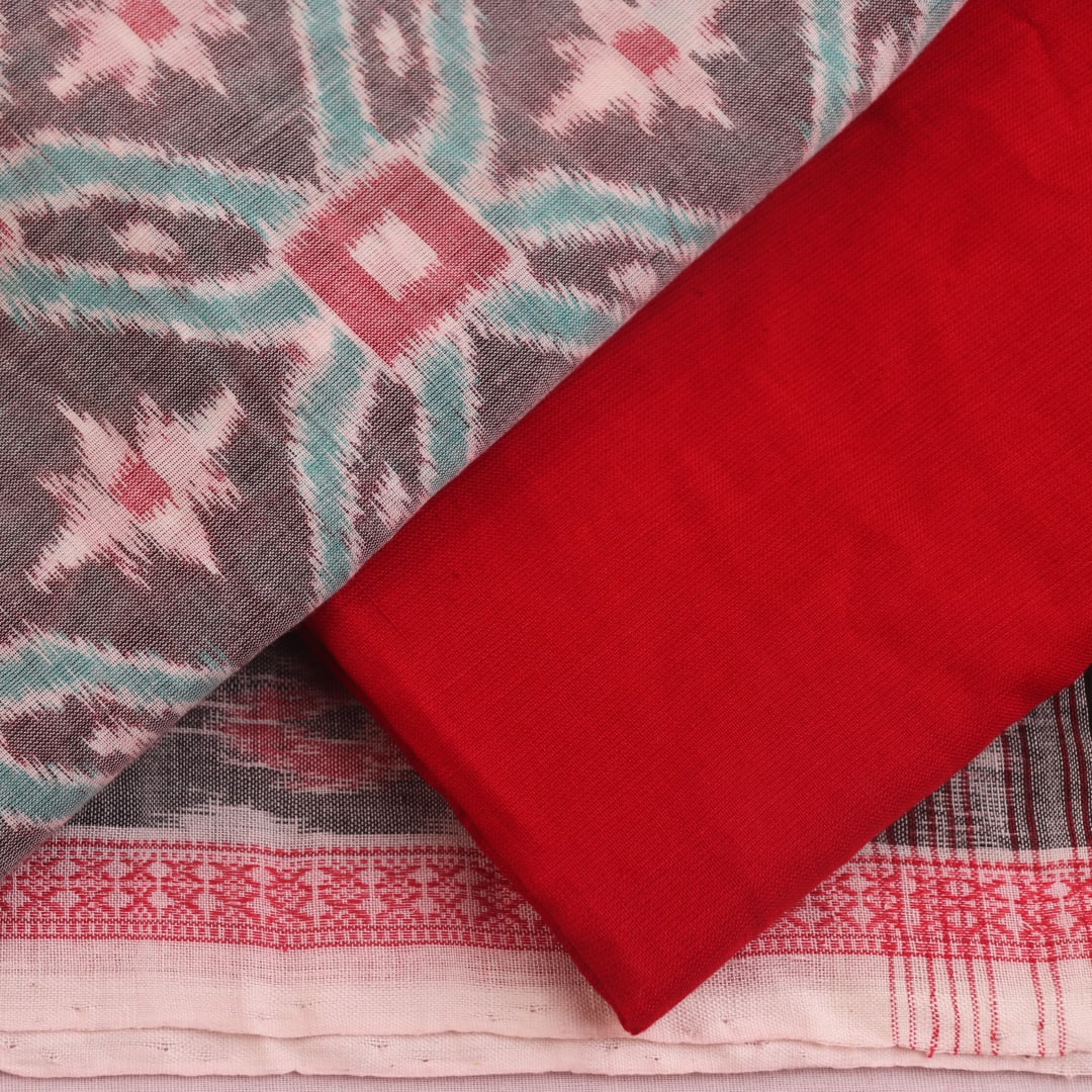 Grey Sambalpuri cotton dress material with red motifs: Detail of matching blouse piece.