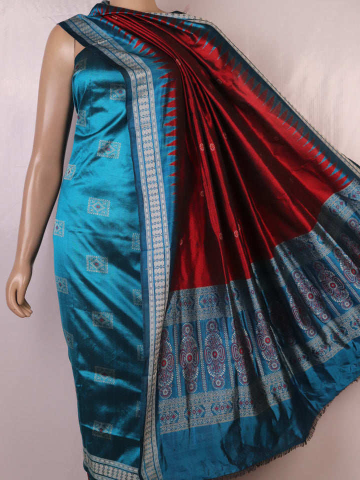 Detail of blue Bomkai silk dress material blouse piece with maroon butta.