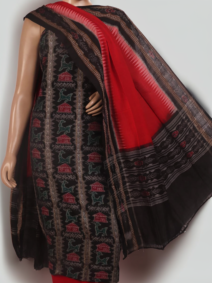 Detail of the black Sambalpuri cotton dress material's blouse piece with red motifs.