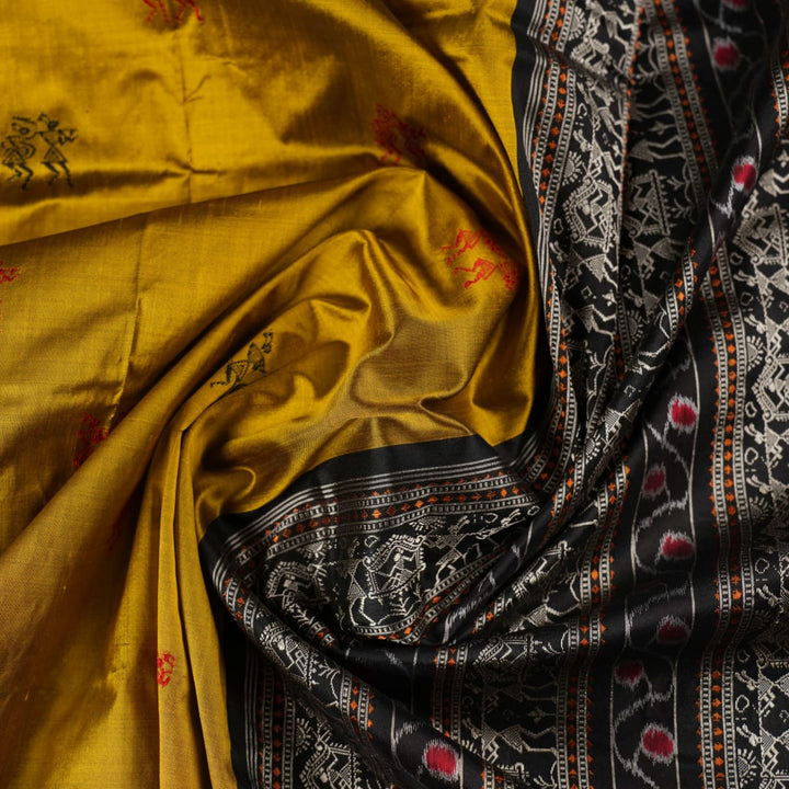 Macro close-up of Bomkai Silk Saree fabric, showing intricate brown & black silk weave.
