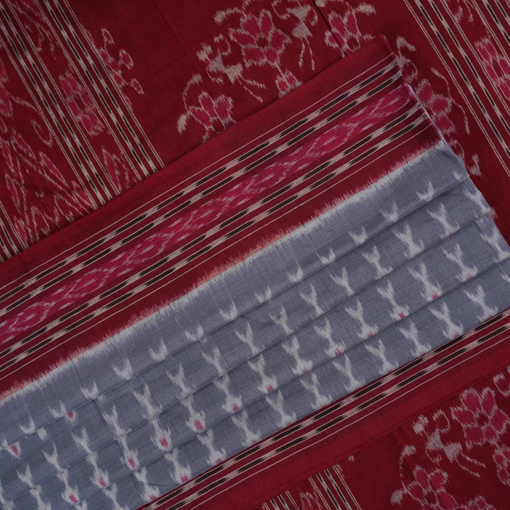 Elegant styling of a grey and maroon Sambalpuri cotton saree with hand-woven ikat motifs draped on a model.