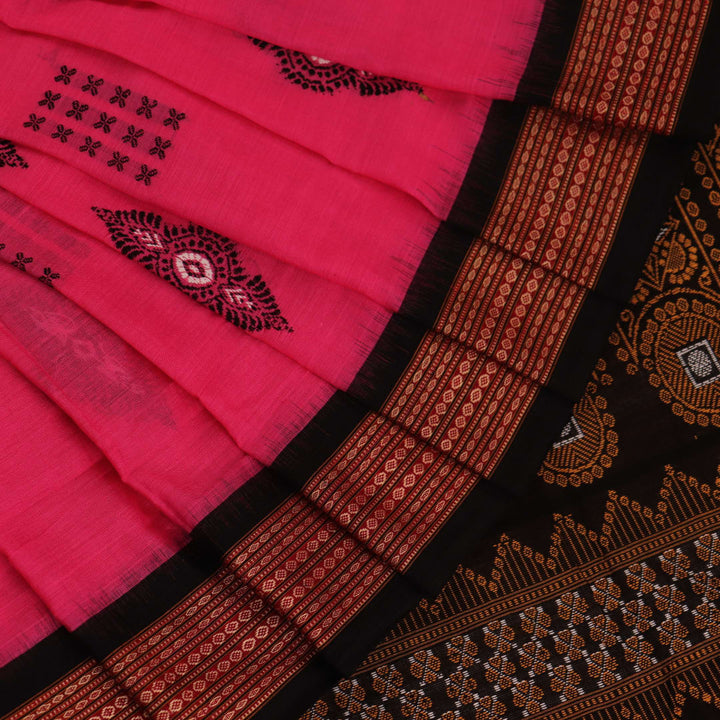 Full view of a pink and black cotton Bomkai saree with a Butta pattern.