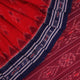 Red and blue Sambalpuri cotton saree draped to show styling and overall look.
