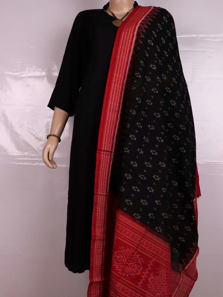 Stylish black dupatta with red motifs, draped elegantly on a model.