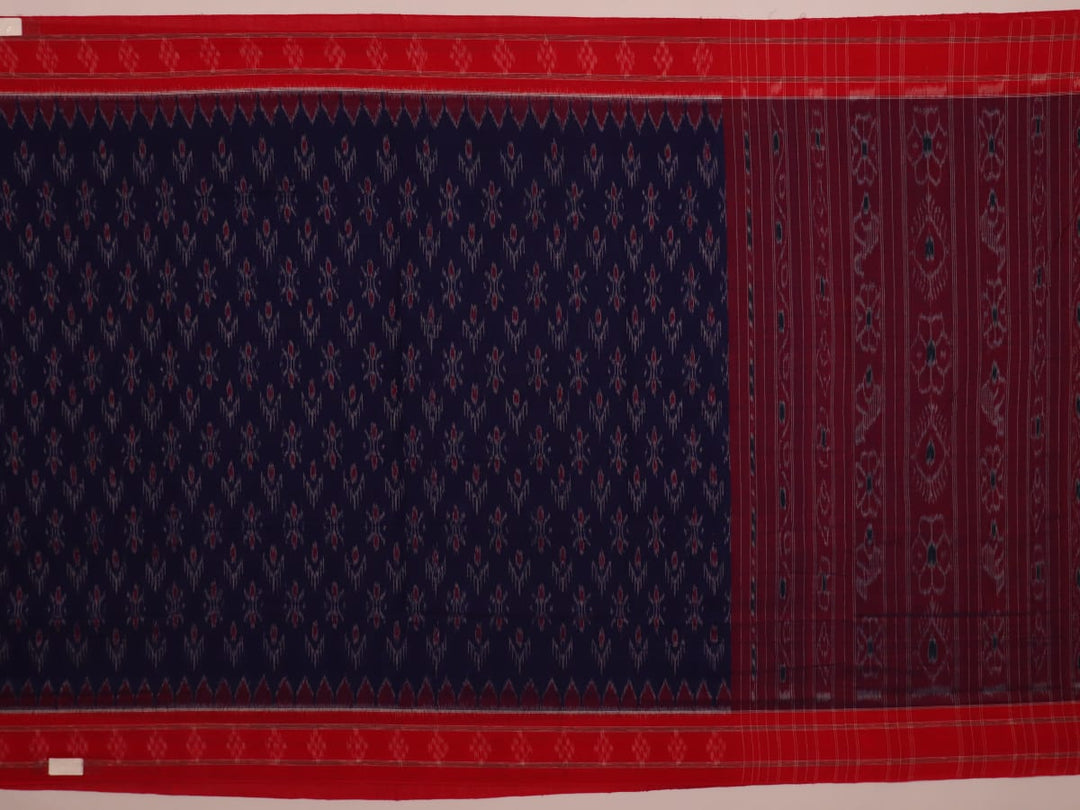 Blue Sambalpuri cotton saree draped, showcasing motifs and styling.