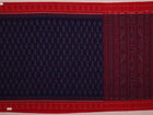 Blue Sambalpuri cotton saree draped, showcasing motifs and styling.