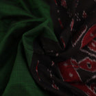 Green and black plain Sambalpuri cotton saree gracefully draped on a model, highlighting its elegant styling.