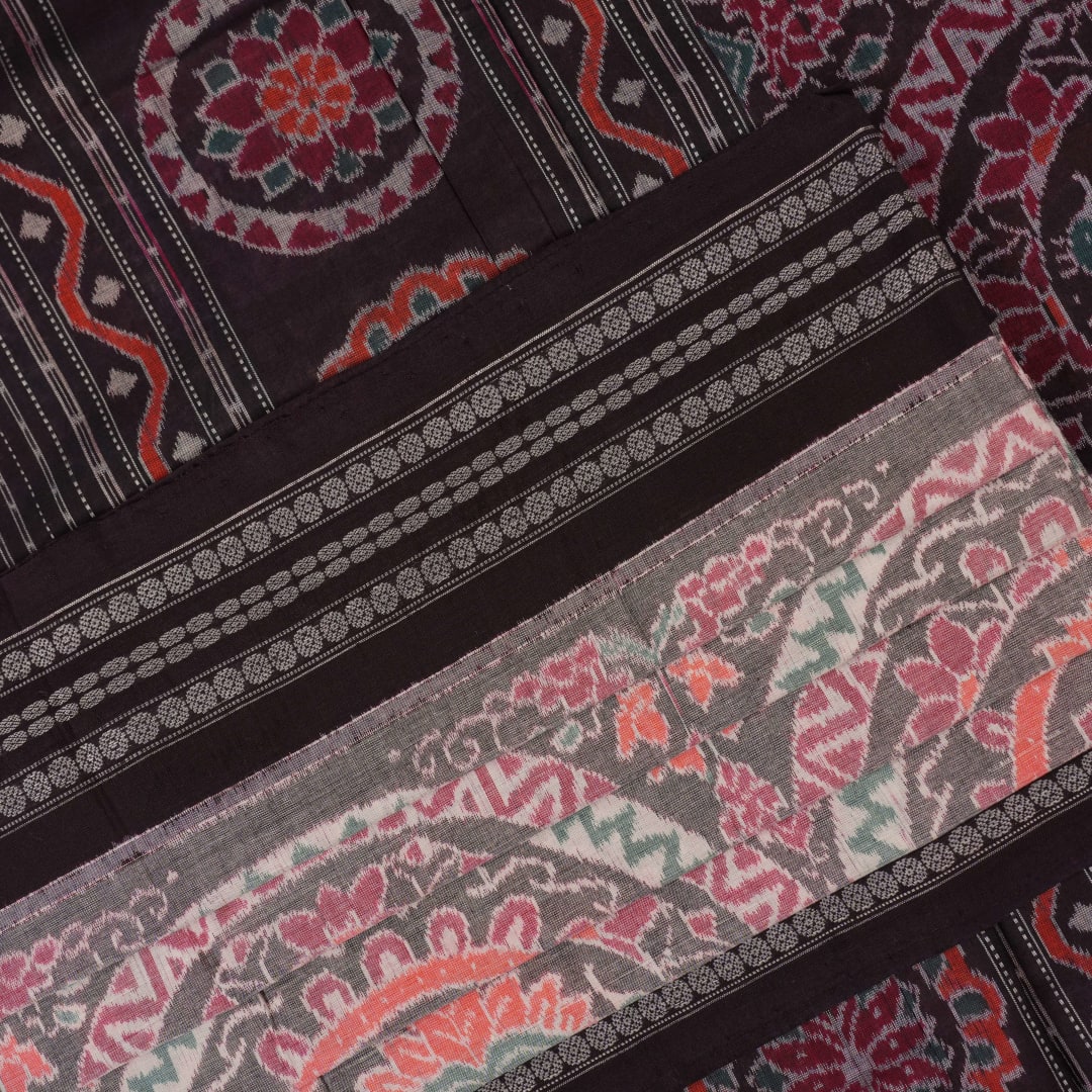 Full length flat layout of a brown and multi color Sambalpuri cotton saree highlighting the complete pattern.