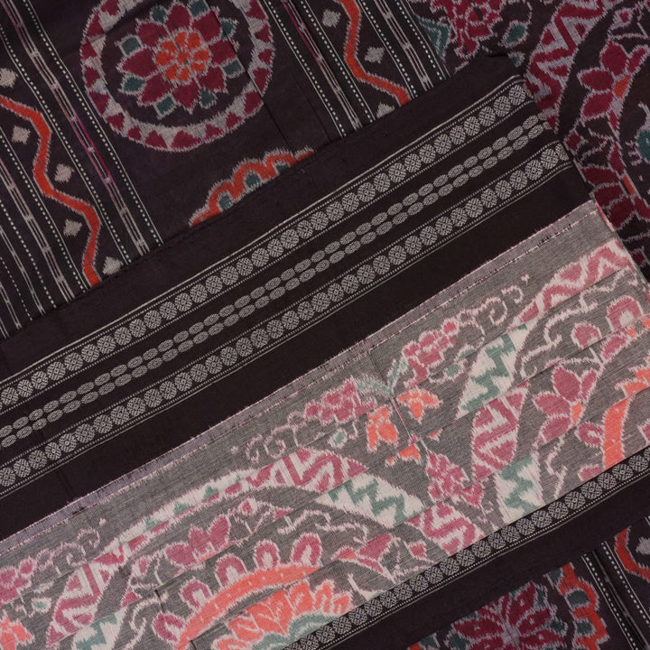 Full length flat layout of a brown and multi color Sambalpuri cotton saree highlighting the complete pattern.