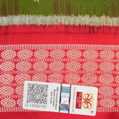 Close-up showing the rich, smooth texture of the green Sambalpuri Silk Saree's weave, highlighting its quality.