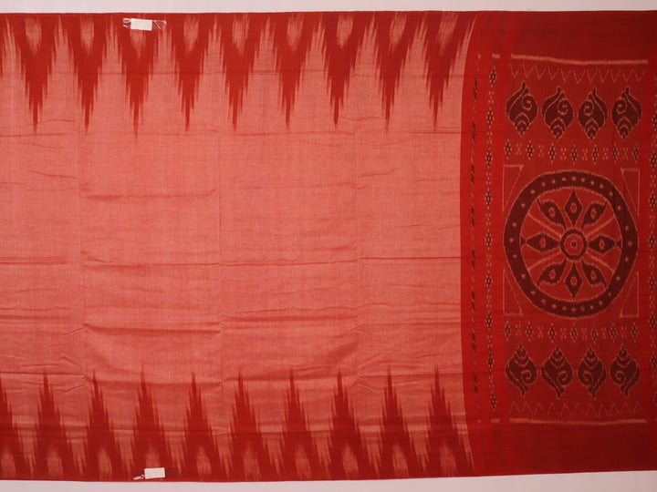 Styling view of a plain multi-color & rust Sambalpuri cotton saree.