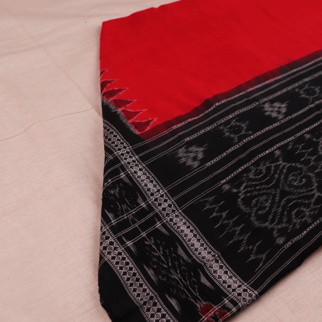 Sambalpuri Cotton Dupatta in Red and Black, with a plain pattern, draped for styling.