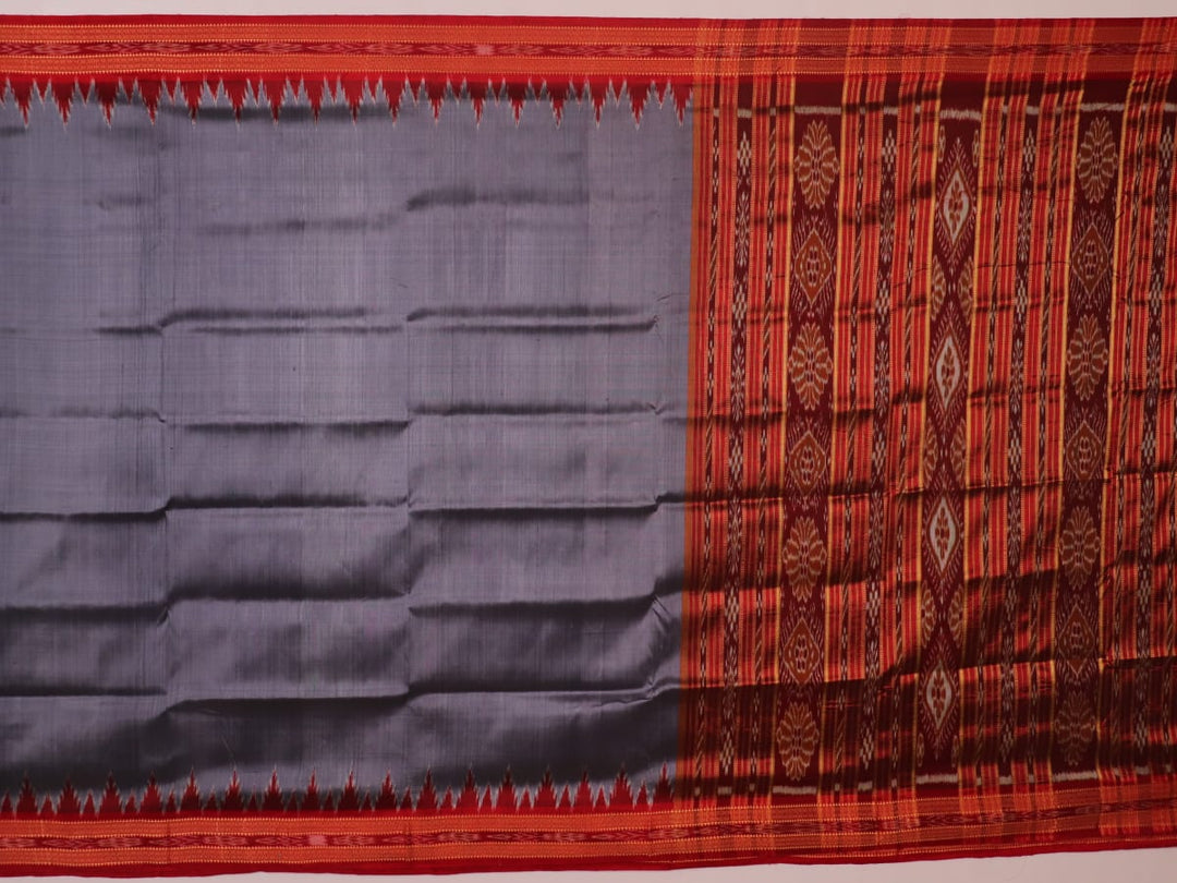 Grey Khandua silk saree styled and draped, showcasing the plain body and red border.