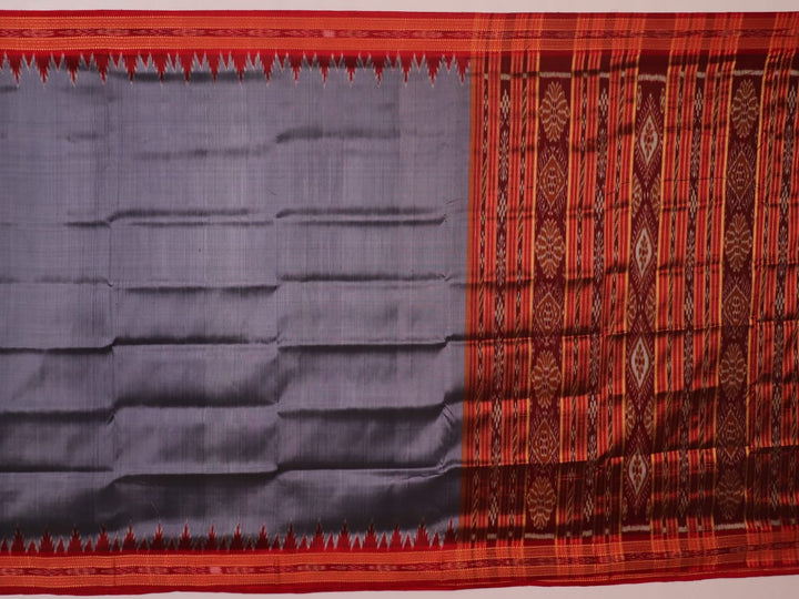 Grey Khandua silk saree styled and draped, showcasing the plain body and red border.
