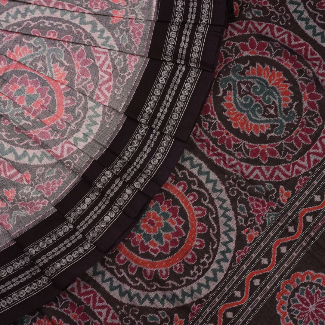 Full length flat layout of a brown and multi color Sambalpuri cotton saree highlighting the complete pattern.