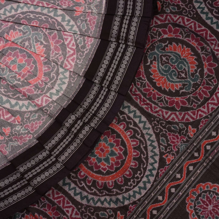 Full length flat layout of a brown and multi color Sambalpuri cotton saree highlighting the complete pattern.