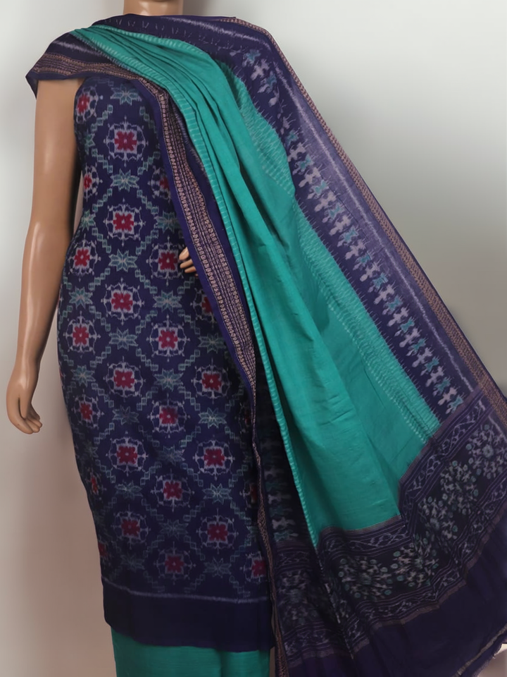 Detail of a Sambalpuri cotton dress material's blouse piece, featuring blue and green motifs.