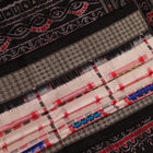 Close-up of white silk handloom saree with black Sambalpuri motifs