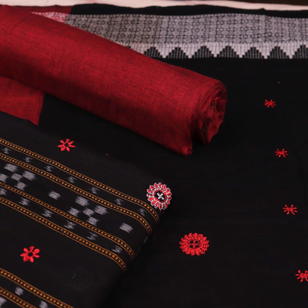 Fourth image in the series: Handloom cotton Sambalpuri dress material in black and maroon, featuring intricate motif patterns on the blouse piece.