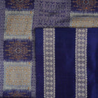 Close-up of luxurious Bomkai Silk Saree fabric texture, highlighting grey and blue handloom weave.