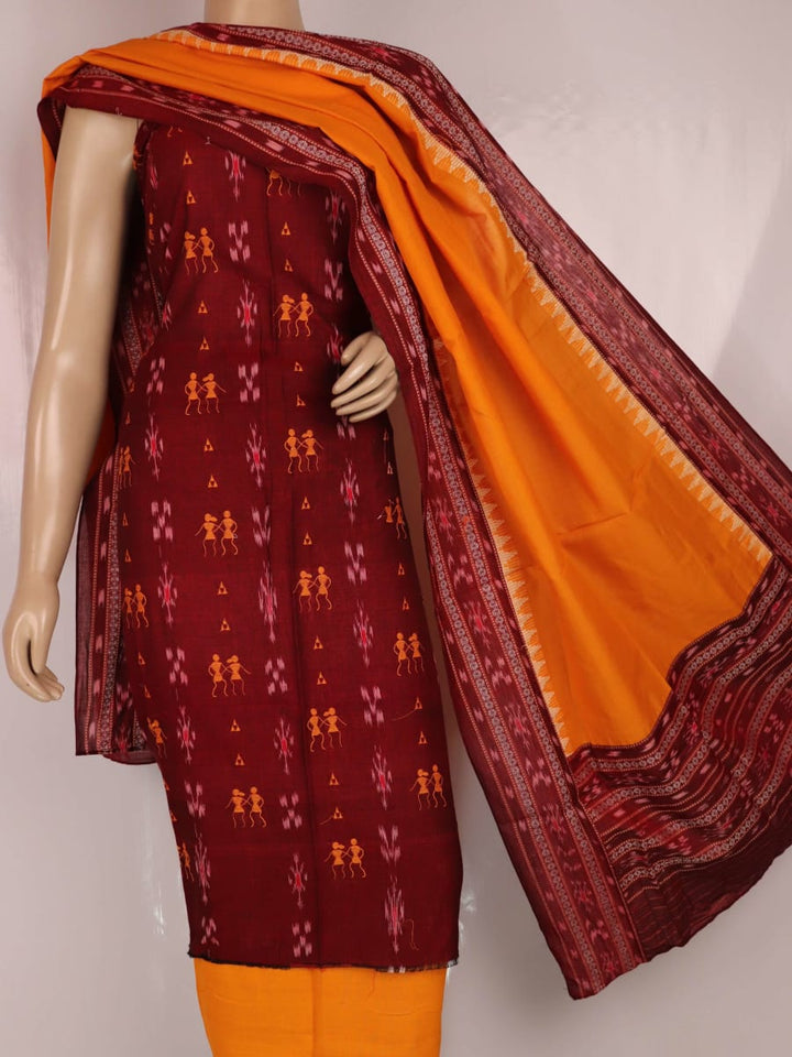 Close-up of yellow doll pattern on maroon cotton Sambalpuri dress material blouse piece