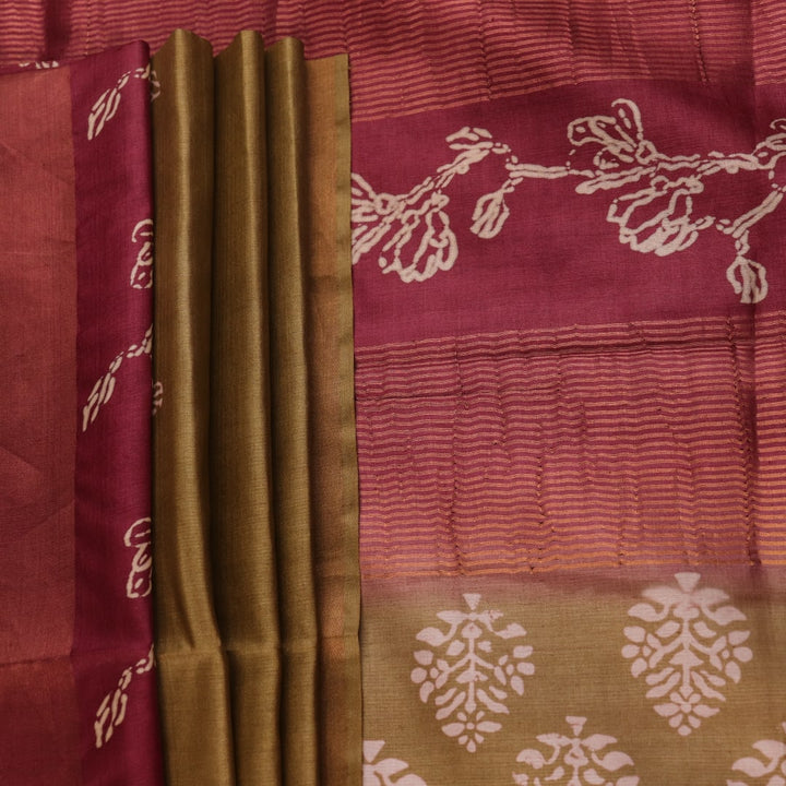 Close-up of the distinctive slub texture of a multi-color printed Tussar Silk saree.